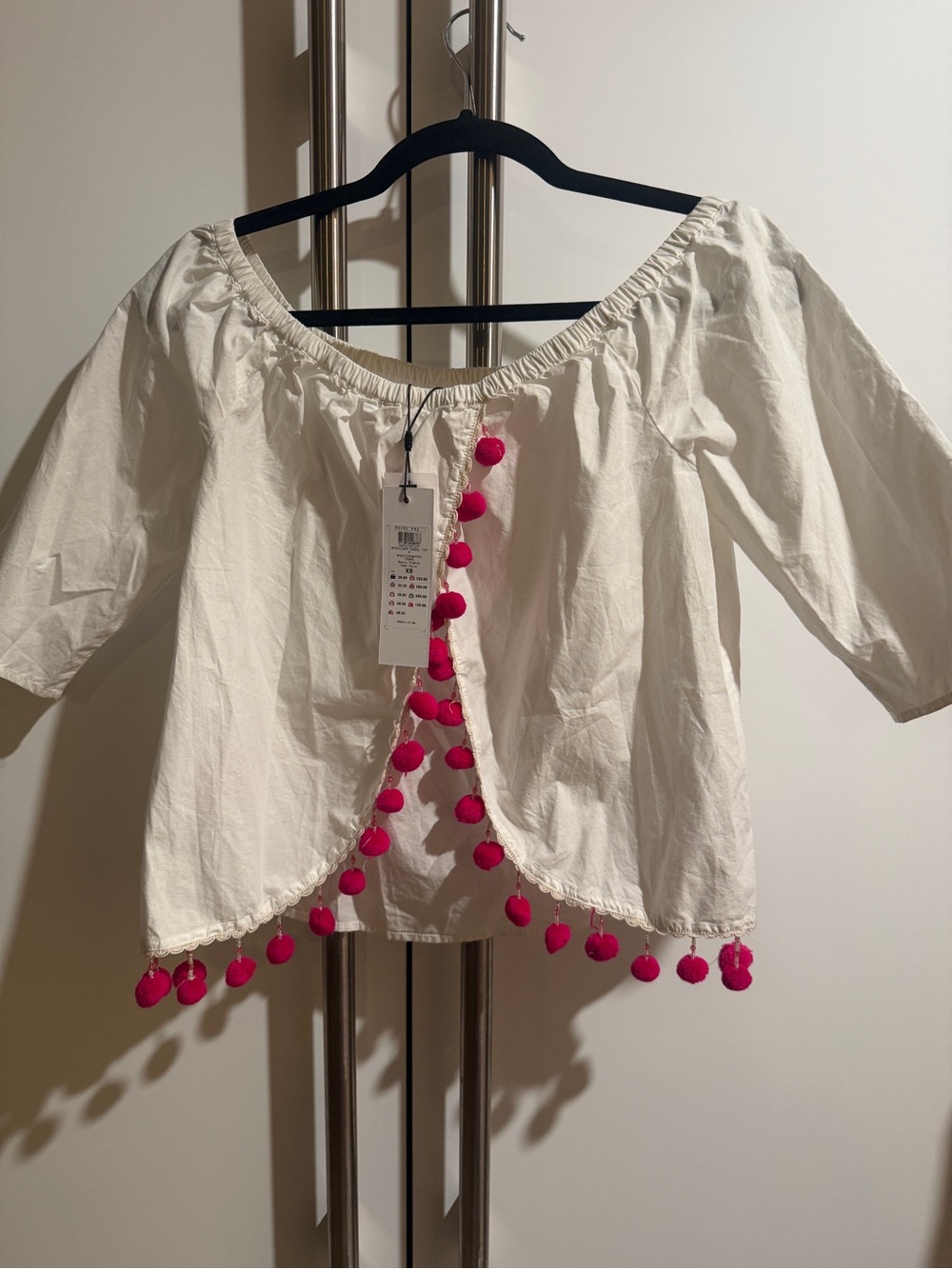 Noisy May White Off-Shoulder Top with Hot Pink Pom Pom Trim